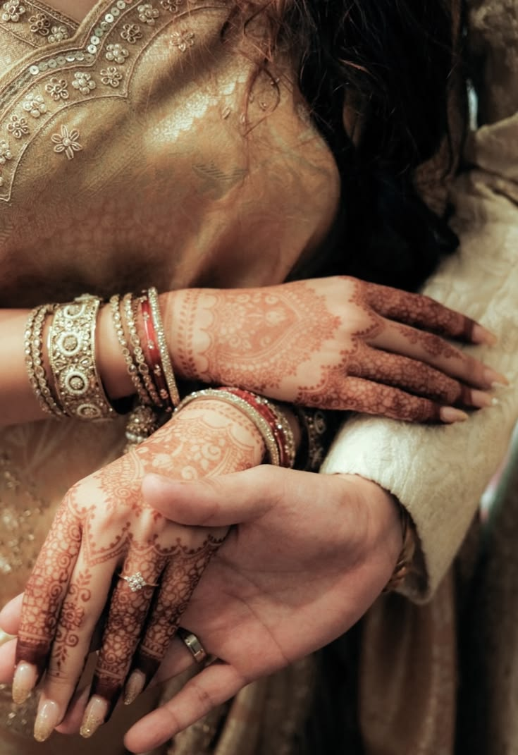 Couple mehendi hands